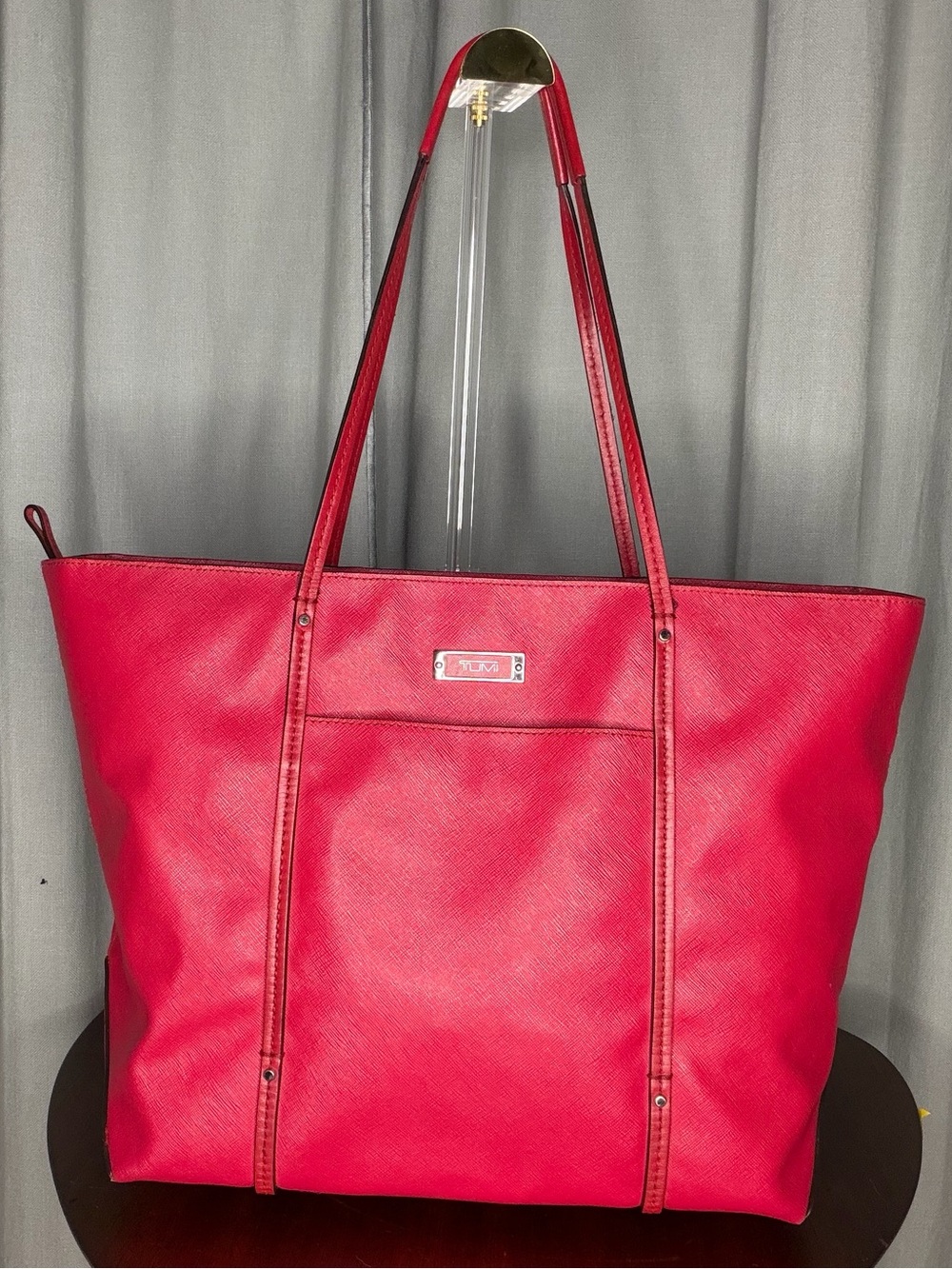Tumi leather Villa Q Tote crafted from red saffiano leather structured design